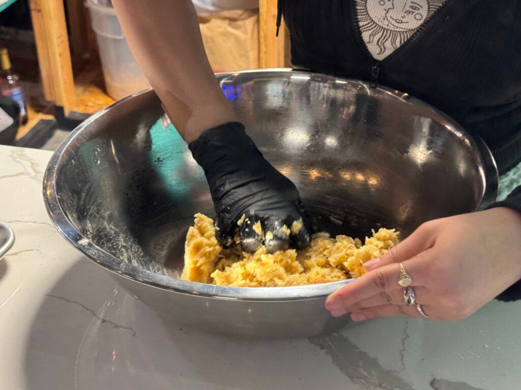 Hands kneading fresh dough - everything made from scratch